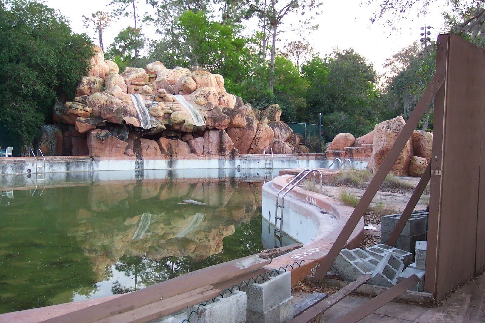 River Country pool abandoned and full of green water.